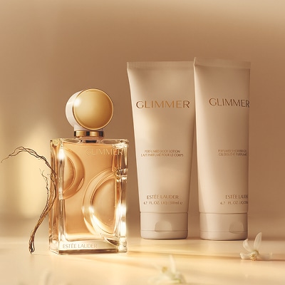 photo of estee lauder fragrance products for layering glimmer eau de parfum and ancillaries